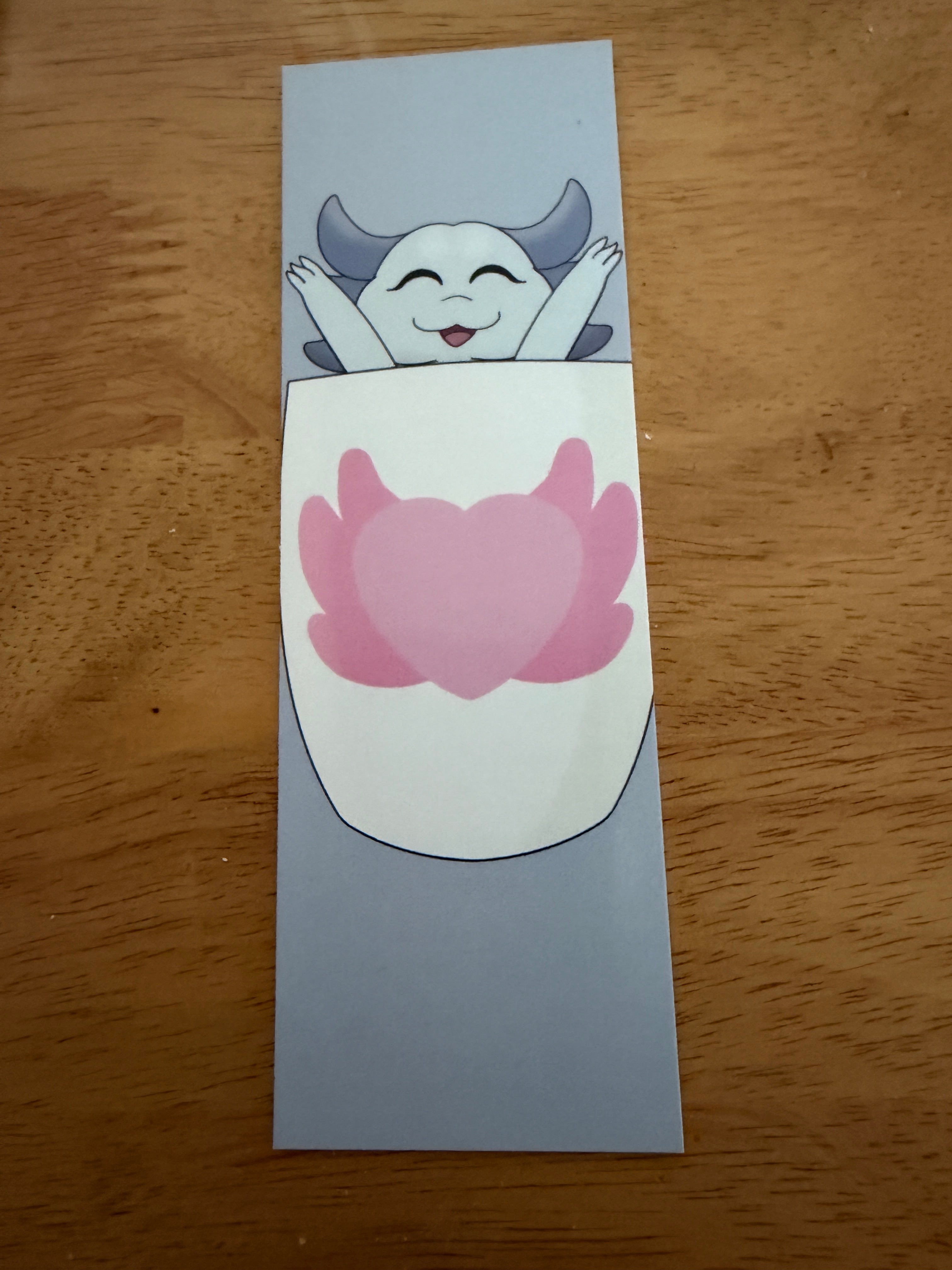 The Axolotl Café – Peek-a-Boo Bookmark